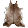 Champagne cowhide rug of about 230 × 190 cm, seen from above: the exact hide you receive