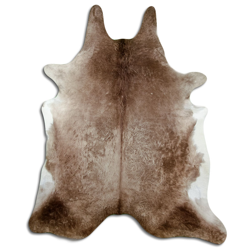 Champagne cowhide rug of about 230 × 190 cm, seen from above: the exact hide you receive