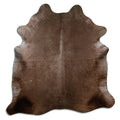 Champagne cowhide rug of about 190 × 180 cm, seen from above: the exact hide you receive