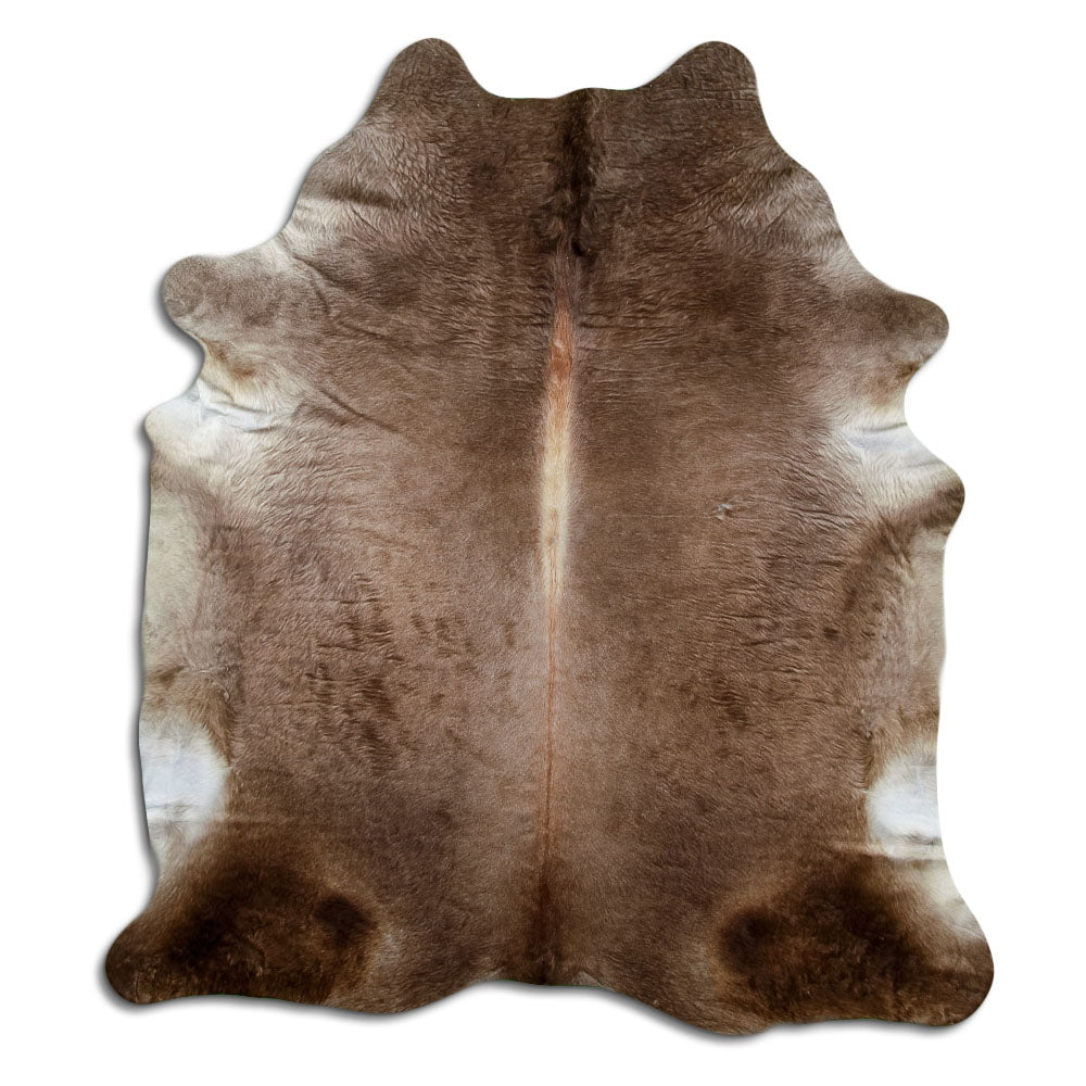 Champagne cowhide rug of about 220 × 200 cm, seen from above: the exact hide you receive