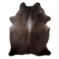 Champagne cowhide rug of about 230 × 170 cm, seen from above: the exact hide you receive