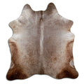 Champagne cowhide rug of about 210 × 190 cm, seen from above: the exact hide you receive