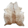 Brindle cowhide rug of about 190 × 160 cm, seen from above: the exact hide you receive