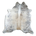 Brindle cowhide rug of about 200 × 190 cm, seen from above: the exact hide you receive