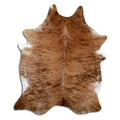 Brindle cowhide rug of about 220 × 170 cm, seen from above: the exact hide you receive