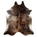 Brindle cowhide rug of about 260 × 220 cm, seen from above: the exact hide you receive