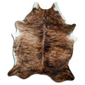 Brindle cowhide rug of about 220 × 180 cm, seen from above: the exact hide you receive