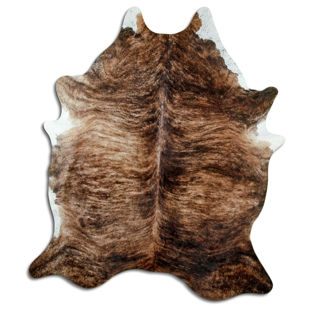 Brindle cowhide rug of about 220 × 180 cm, seen from above: the exact hide you receive