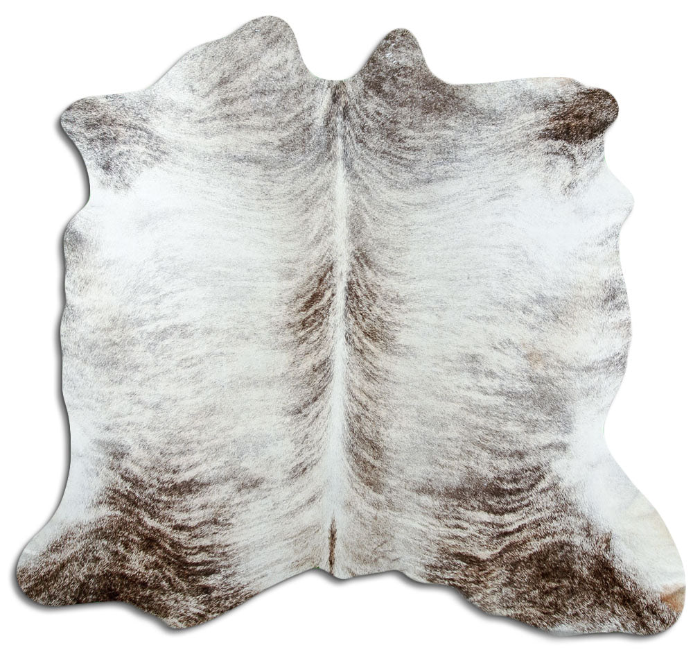 Brindle cowhide rug of about 170 × 190 cm, seen from above: the exact hide you receive
