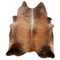 Brindle cowhide rug of about 200 × 180 cm, seen from above: the exact hide you receive