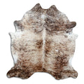 Brindle cowhide rug of about 230 × 210 cm, seen from above: the exact hide you receive