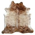 Brindle cowhide rug of about 210 × 210 cm, seen from above: the exact hide you receive