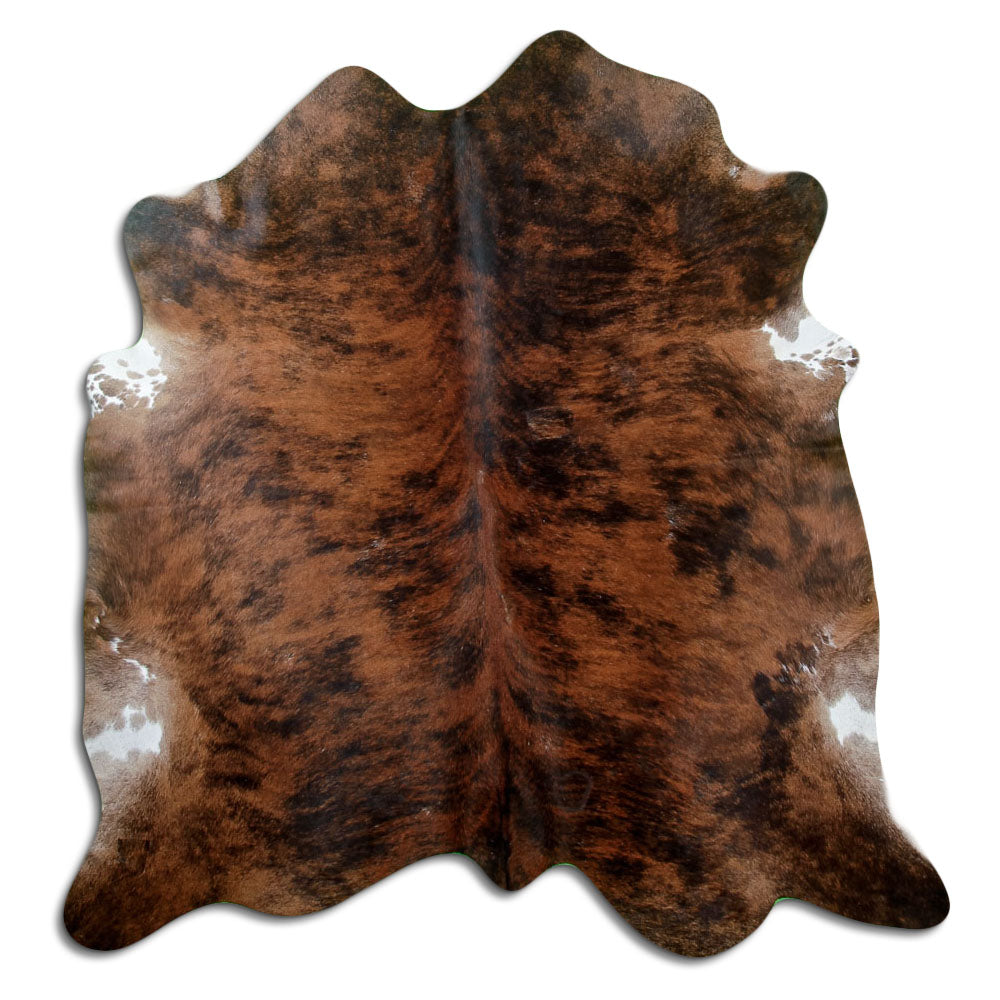Brindle cowhide rug of about 180 × 180 cm, seen from above: the exact hide you receive