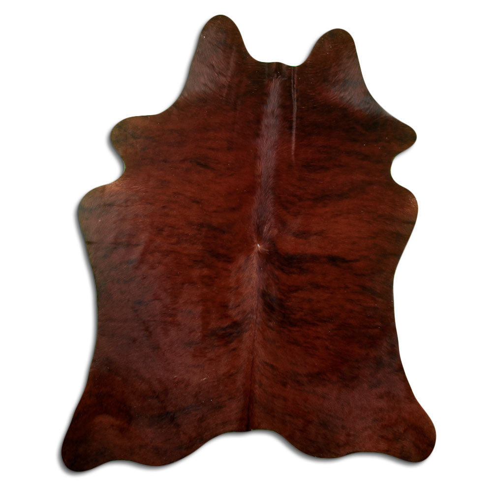 Brindle cowhide rug of about 190 × 150 cm, seen from above: the exact hide you receive