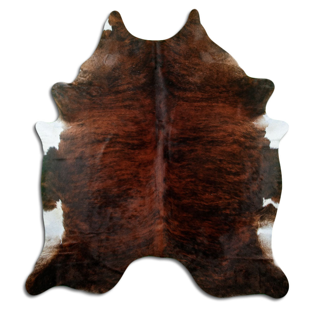 Brindle cowhide rug of about 200 × 180 cm, seen from above: the exact hide you receive