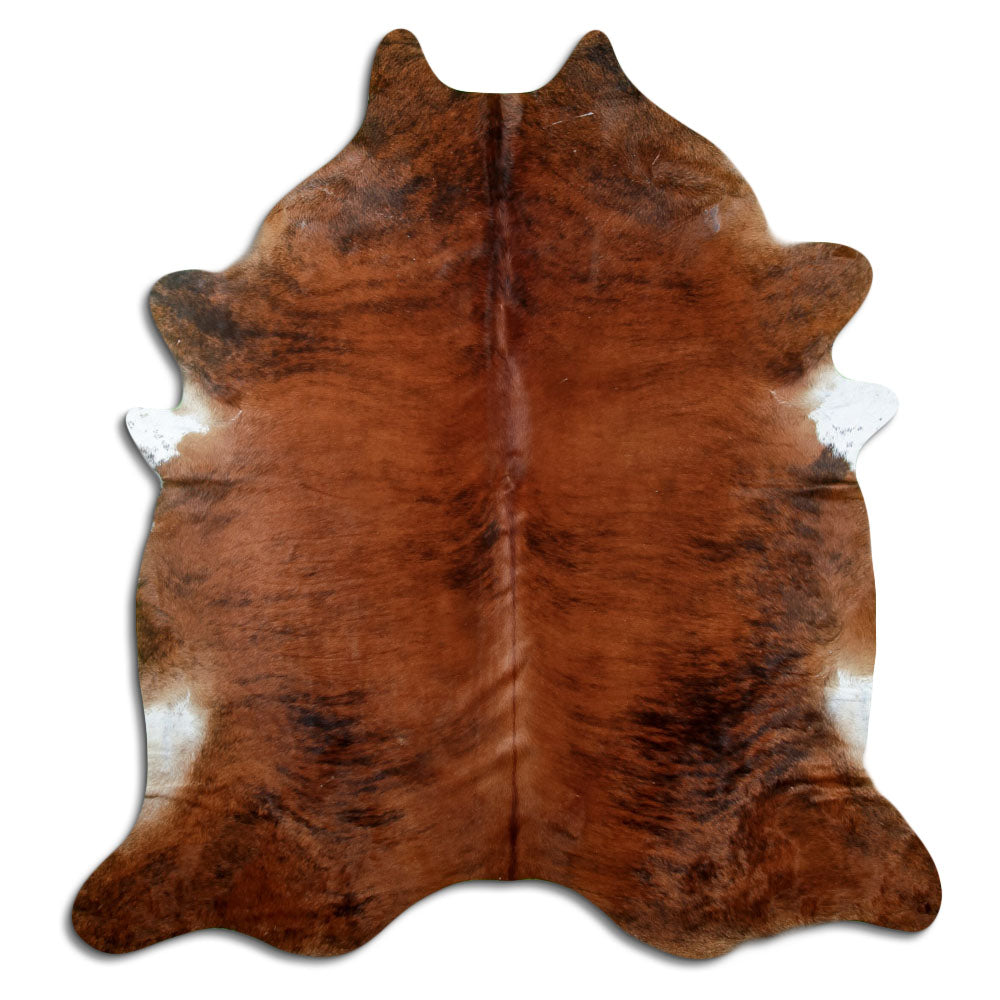 Brindle cowhide rug of about 210 × 200 cm, seen from above: the exact hide you receive