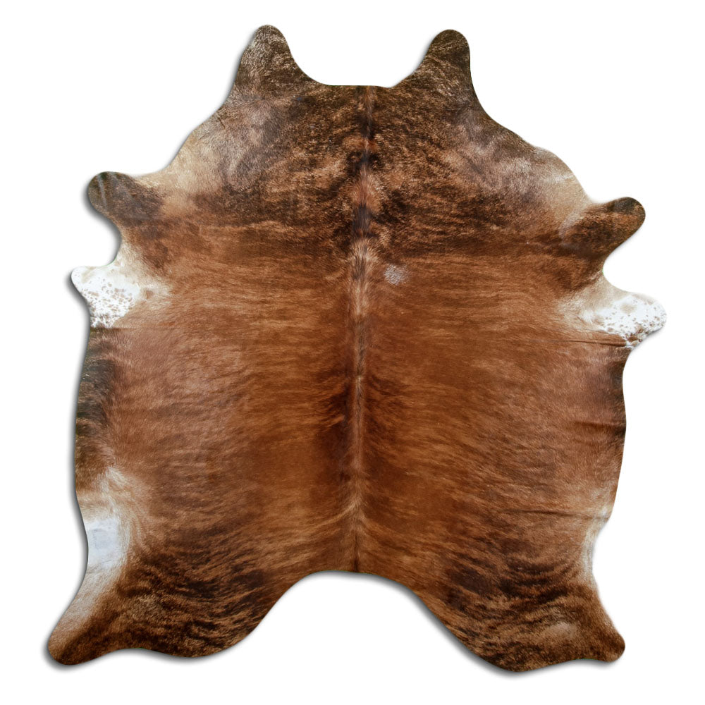 Brindle cowhide rug of about 200 × 180 cm, seen from above: the exact hide you receive