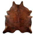 Brindle cowhide rug of about 200 × 180 cm, seen from above: the exact hide you receive