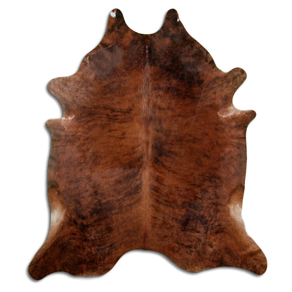 Brindle cowhide rug of about 220 × 190 cm, seen from above: the exact hide you receive