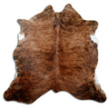 Brindle cowhide rug of about 180 × 190 cm, seen from above: the exact hide you receive