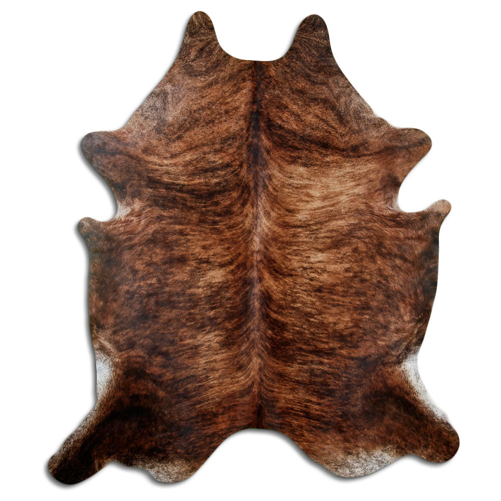 Brindle cowhide rug of about 240 × 200 cm, seen from above: the exact hide you receive