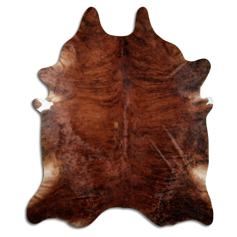 Brindle cowhide rug of about 270 × 230 cm, seen from above: the exact hide you receive