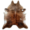 Brindle cowhide rug of about 230 × 200 cm, seen from above: the exact hide you receive