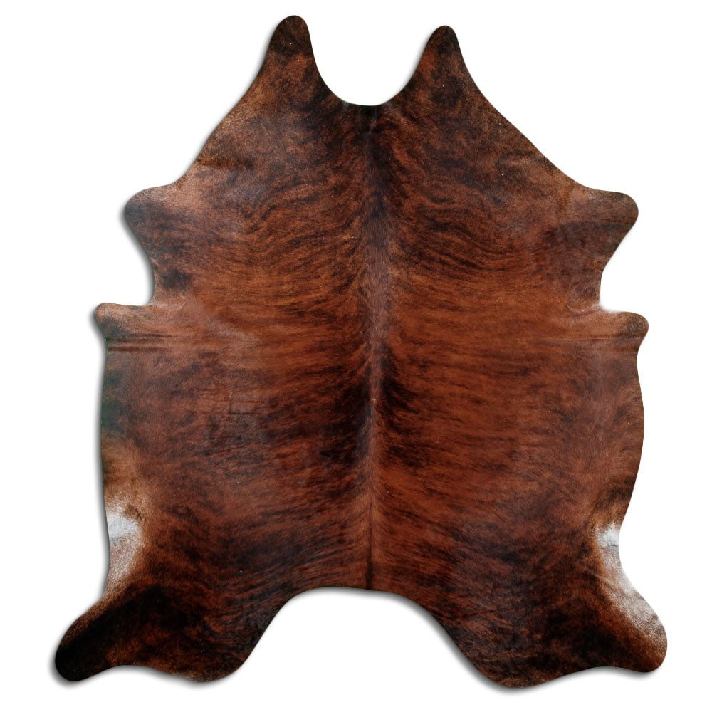Brindle cowhide rug of about 230 × 210 cm, seen from above: the exact hide you receive
