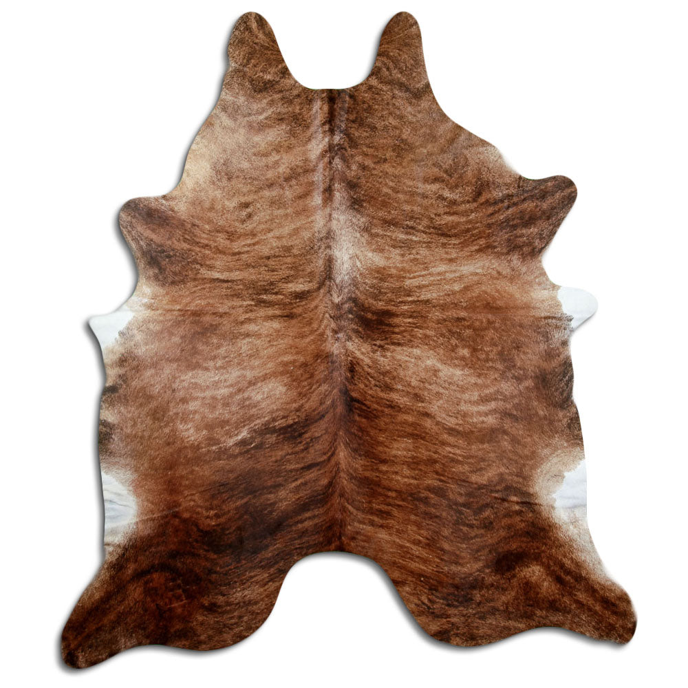 Brindle cowhide rug of about 240 × 210 cm, seen from above: the exact hide you receive