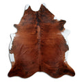 Brindle cowhide rug of about 220 × 200 cm, seen from above: the exact hide you receive