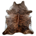 Brindle cowhide rug of about 220 × 200 cm, seen from above: the exact hide you receive