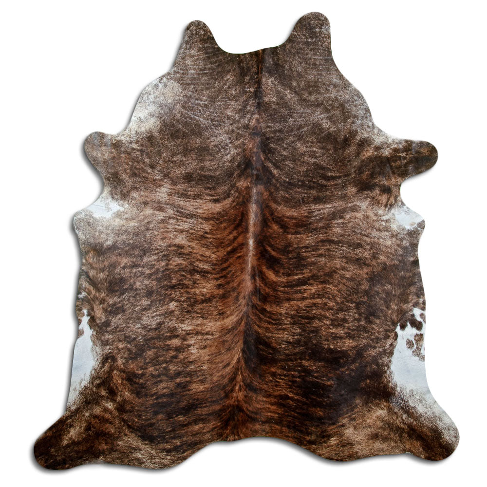 Brindle cowhide rug of about 220 × 200 cm, seen from above: the exact hide you receive