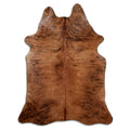 Brindle cowhide rug of about 210 × 160 cm, seen from above: the exact hide you receive