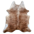 Brindle cowhide rug of about 210 × 190 cm, seen from above: the exact hide you receive