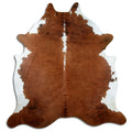 Brindle cowhide rug of about 220 × 210 cm, seen from above: the exact hide you receive