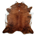 Brindle cowhide rug of about 220 × 210 cm, seen from above: the exact hide you receive