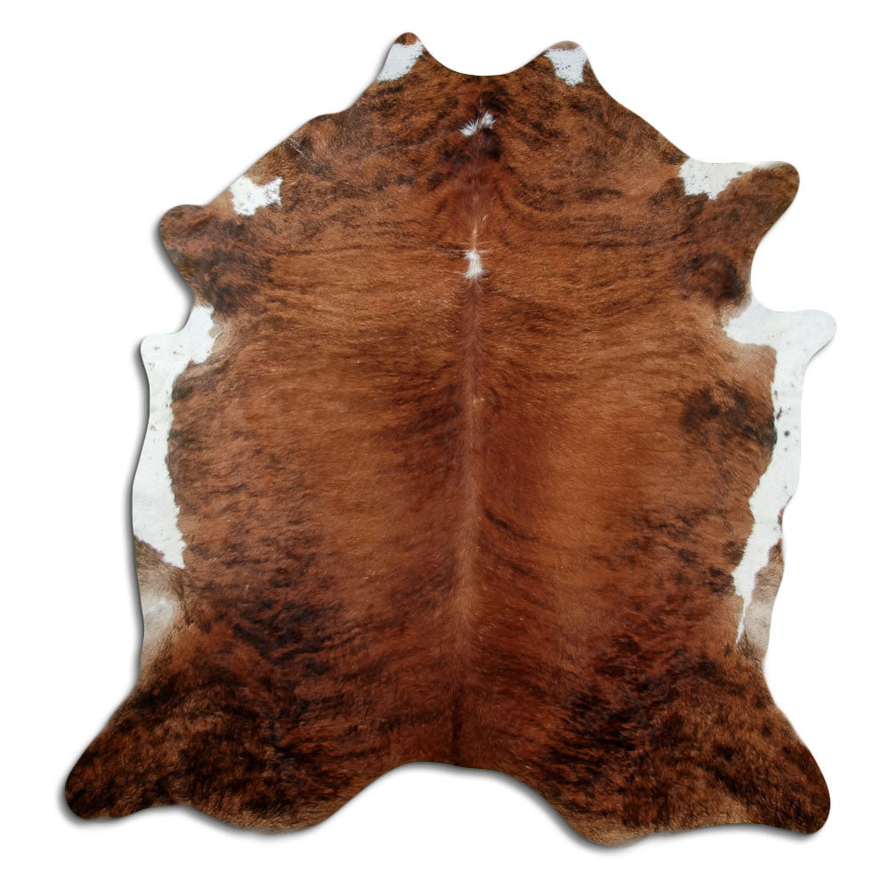 Brindle cowhide rug of about 220 × 210 cm, seen from above: the exact hide you receive