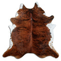 Brindle cowhide rug of about 210 × 210 cm, seen from above: the exact hide you receive