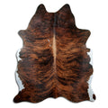 Brindle cowhide rug of about 230 × 180 cm, seen from above: the exact hide you receive