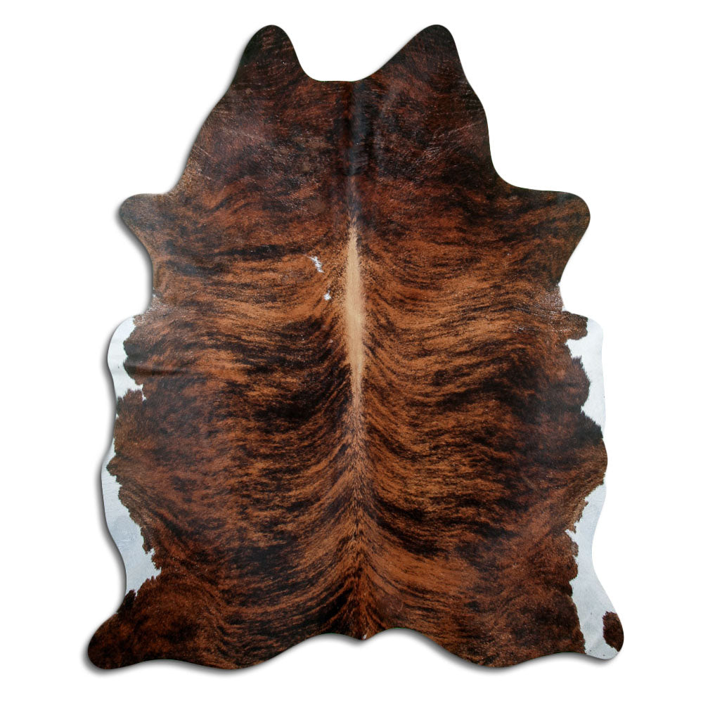 Brindle cowhide rug of about 230 × 180 cm, seen from above: the exact hide you receive
