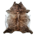 Brindle cowhide rug of about 220 × 200 cm, seen from above: the exact hide you receive