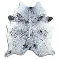 Salt and pepper cowhide rug of about 210 × 180 cm, seen from above: the exact hide you receive