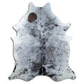 Salt and pepper cowhide rug of about 230 × 190 cm, seen from above: the exact hide you receive