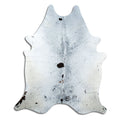 Salt and pepper cowhide rug of about 220 × 190 cm, seen from above: the exact hide you receive