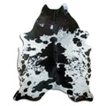 Salt and pepper cowhide rug of about 210 × 170 cm, seen from above: the exact hide you receive