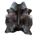 Salt and pepper cowhide rug of about 170 × 140 cm, seen from above: the exact hide you receive
