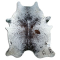 Salt and pepper cowhide rug of about 220 × 190 cm, seen from above: the exact hide you receive