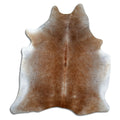 Tan and grey cowhide rug of about 190 × 170 cm, seen from above: the exact hide you receive