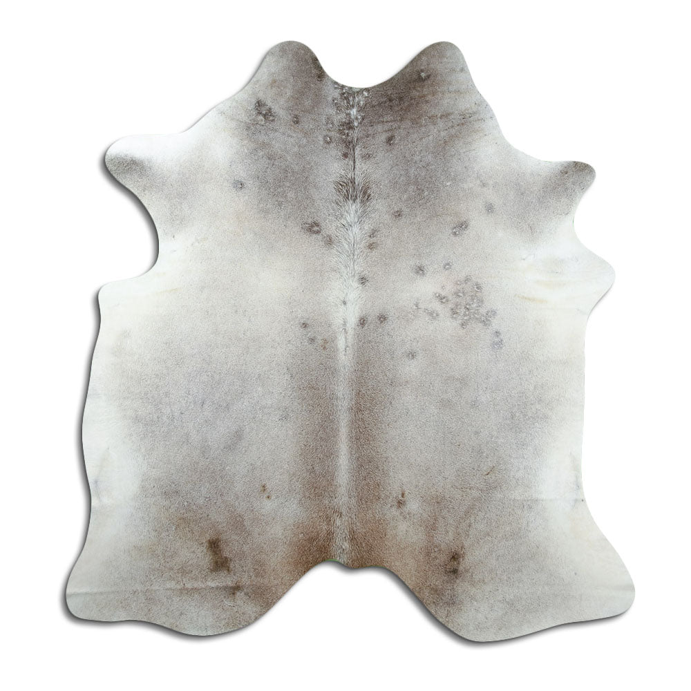 Tan and grey cowhide rug of about 190 × 180 cm, seen from above: the exact hide you receive