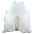 Tan and grey cowhide rug of about 200 × 180 cm, seen from above: the exact hide you receive